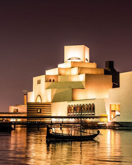 Museum of Islamic Art in Qatar at night lit up